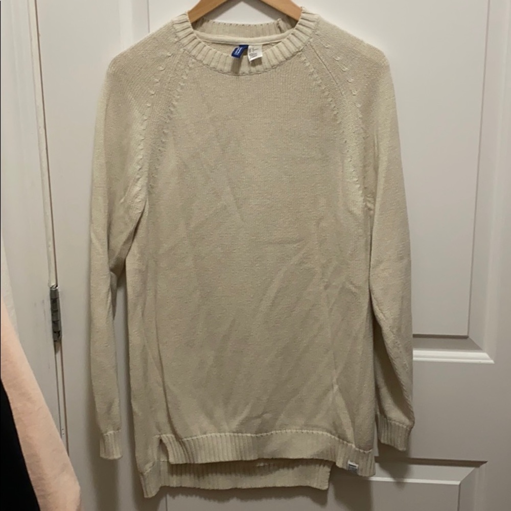 A classic cream colored sweatshirt